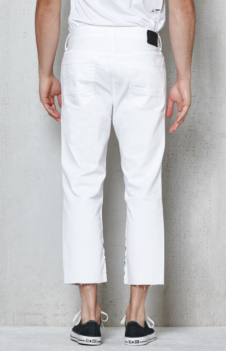 All Listings Available In White Button Closure Zip Fly Knee Blowout 5-Pocket Slim Fit 98% Cotton 2% Spandex.