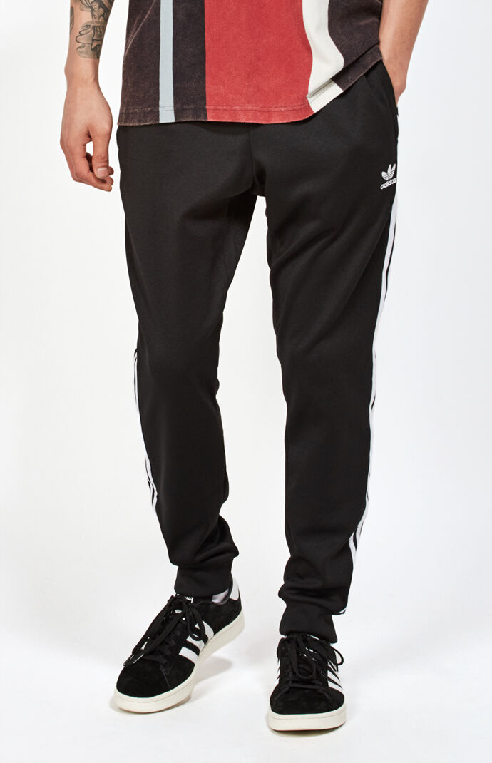 superstar track pants in black