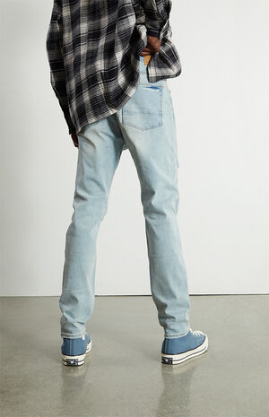 Medium Ripped Slim Taper Jeans image number 4