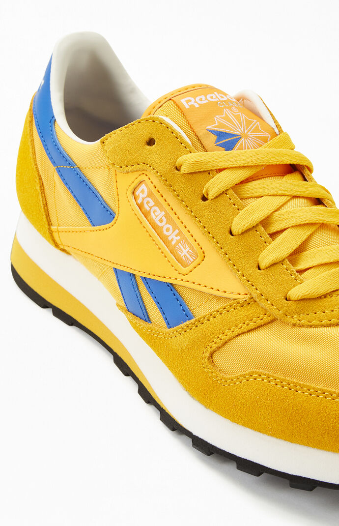 yellow reebok shoes