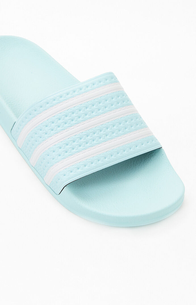 pale blue adidas sliders