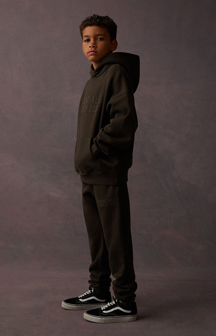Boy in black hoodie cheap