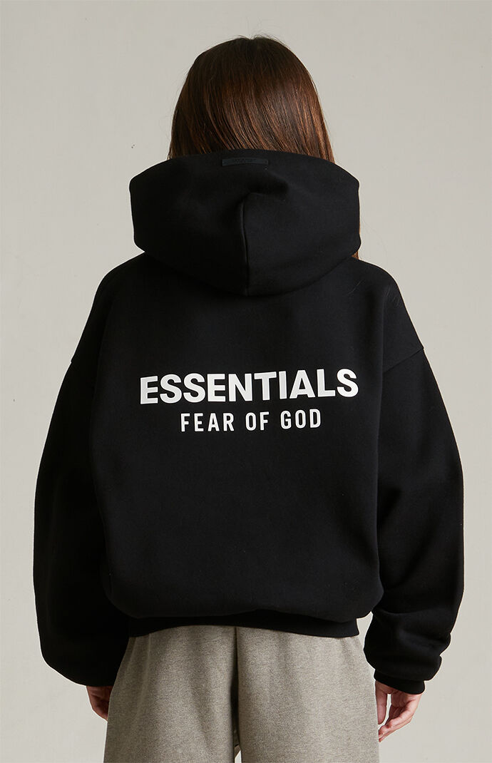 Fear of God Essentials Kids Black Fleece Hoodie | Pacsun