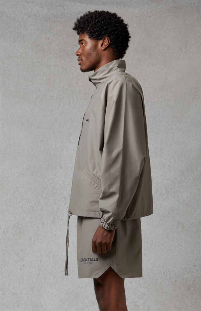Fear of god essentials sale track jacket silver reflective