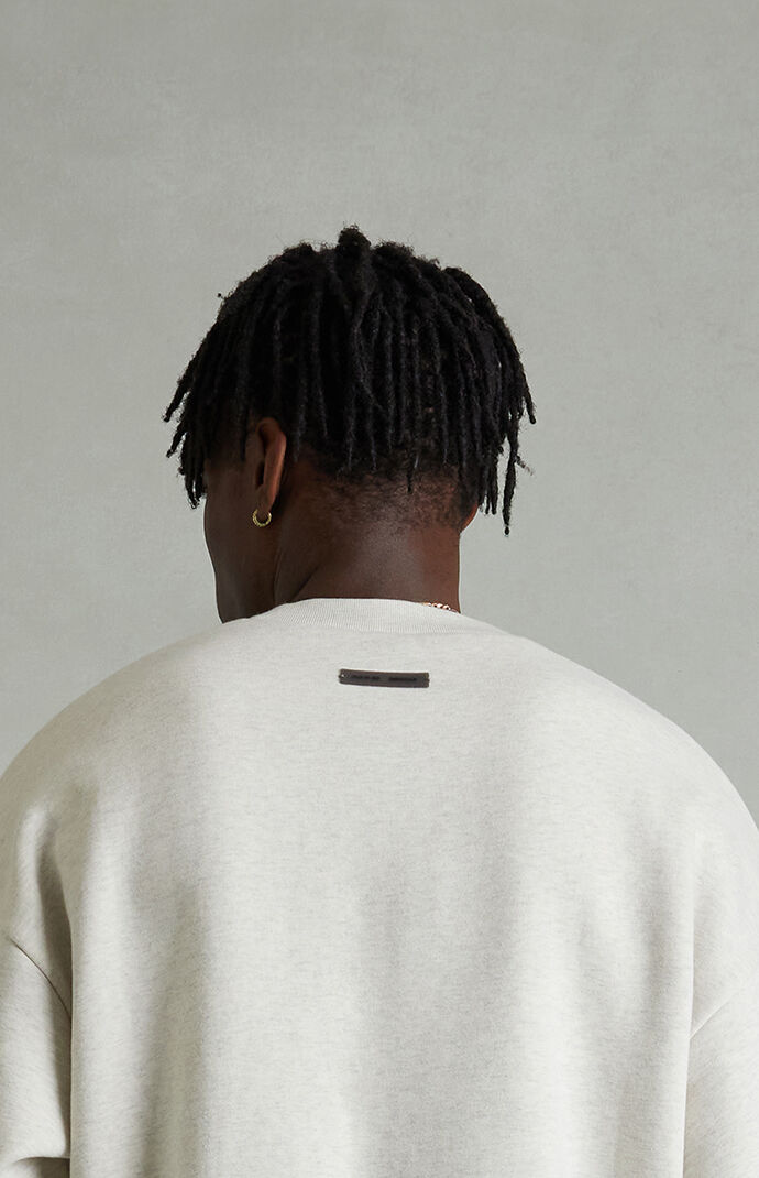 Fear of God ESSENTIALS Heather Oatmeal Embossed Classic Crew Neck Sweatshirt