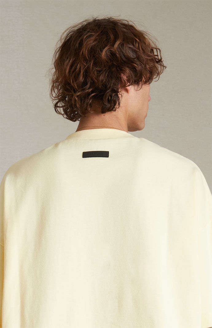 Fear of God Essentials Garden Yellow Heavy T-Shirt | PacSun