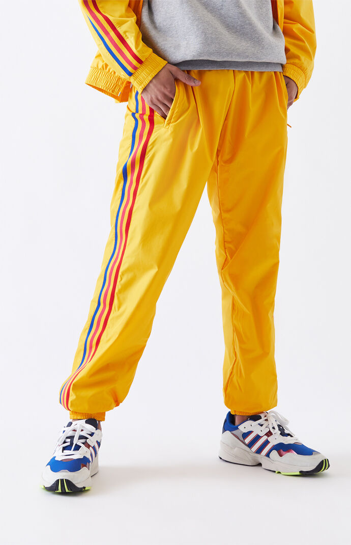 adidas track pants yellow stripe