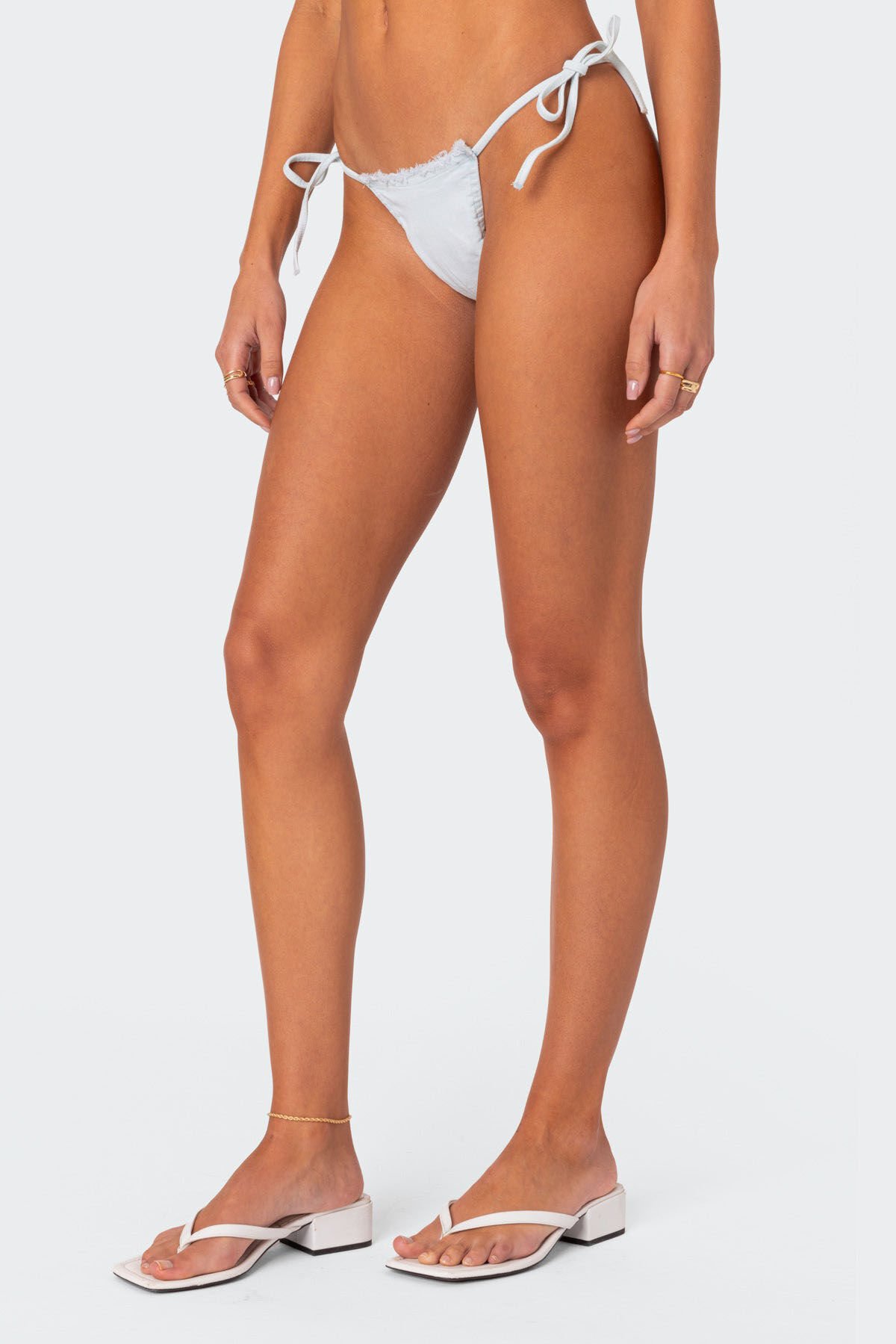 Edikted Didi Distressed Denim String Bikini Bottom | PacSun