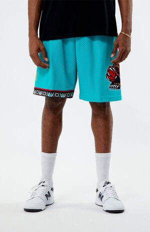 Men's Mitchell & Ness Cream Vancouver Grizzlies Chainstitched Swingman Shorts