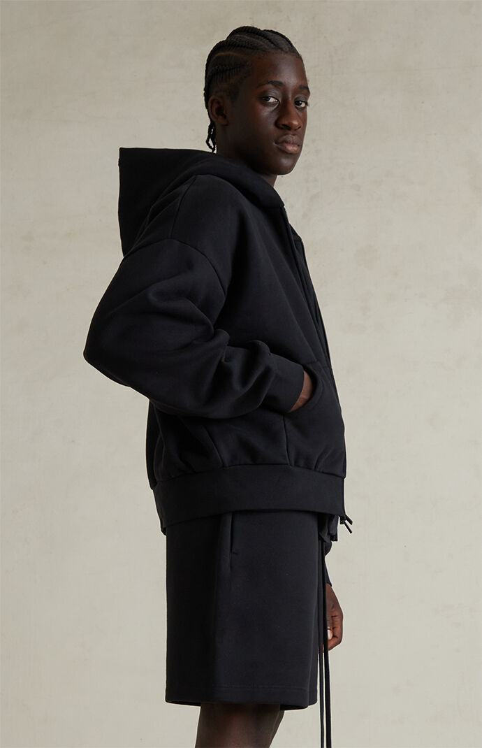 Fear of God ESSENTIALS Jet Black Classic Fleece Zip Up Hoodie | Pacsun