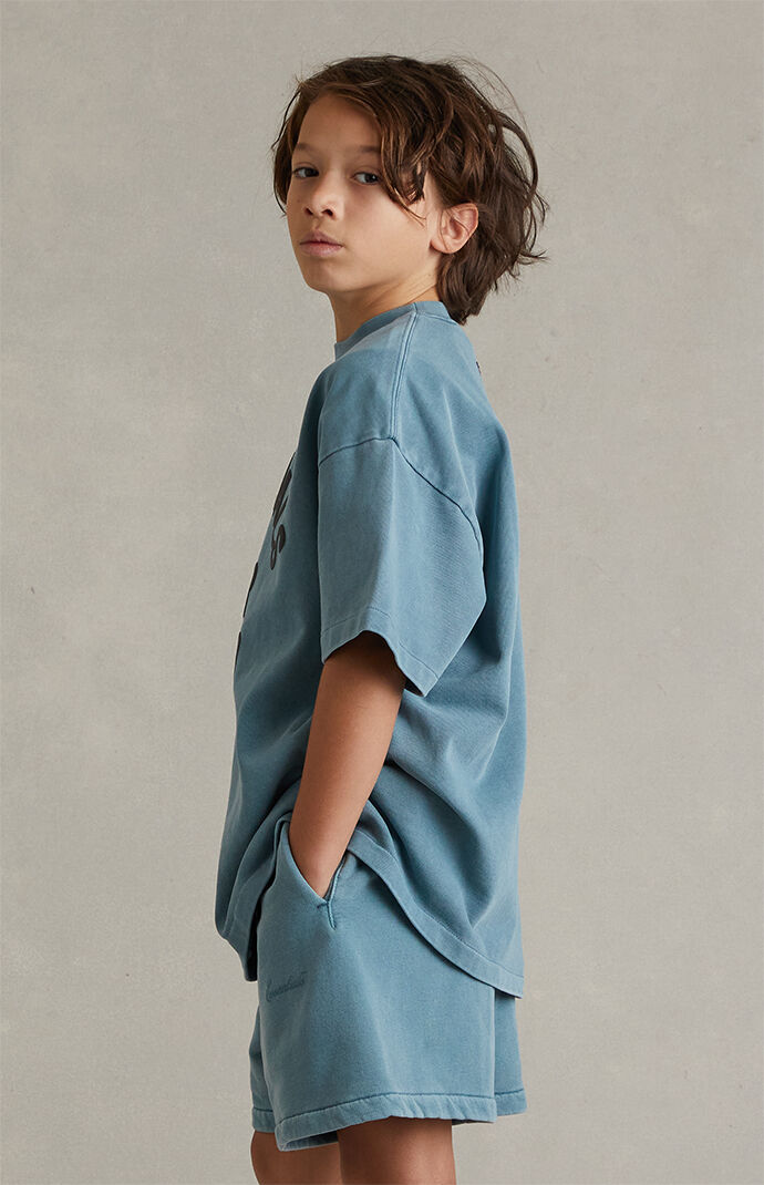 Fear of God ESSENTIALS Kids Faded Coastal Campus ’90s Short Sleeve T-Shirt