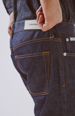 Essentials Raw Indigo Skinny Taper Jeans image number 5