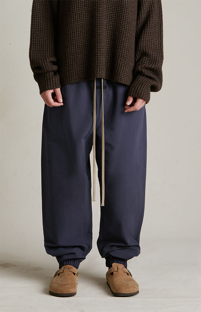Fear of God ESSENTIALS Marine Military Nylon Track Pants | Pacsun