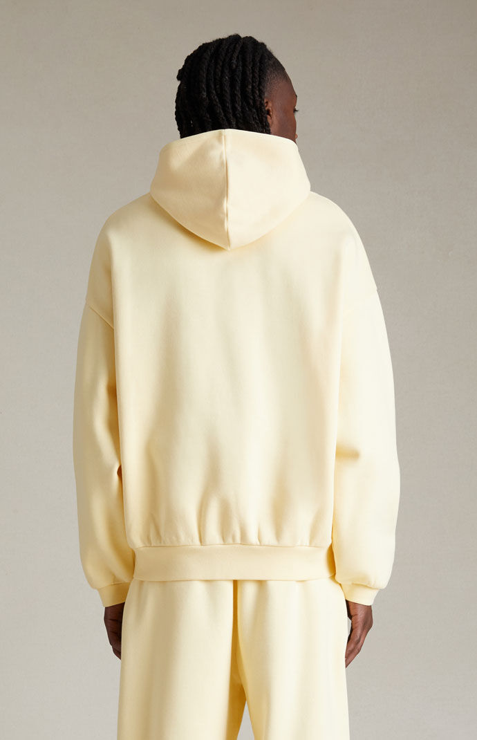 Fear of God Essentials Garden Yellow Hoodie | PacSun