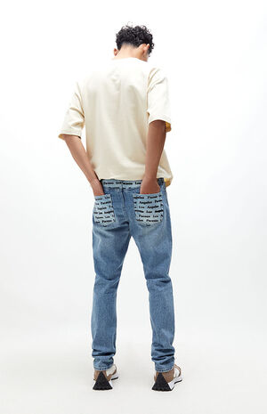 Graphic Medium Indigo Slim Taper Jeans image number 1