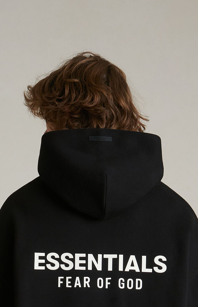 Fear of God Essentials Black Fleece Hoodie | PacSun