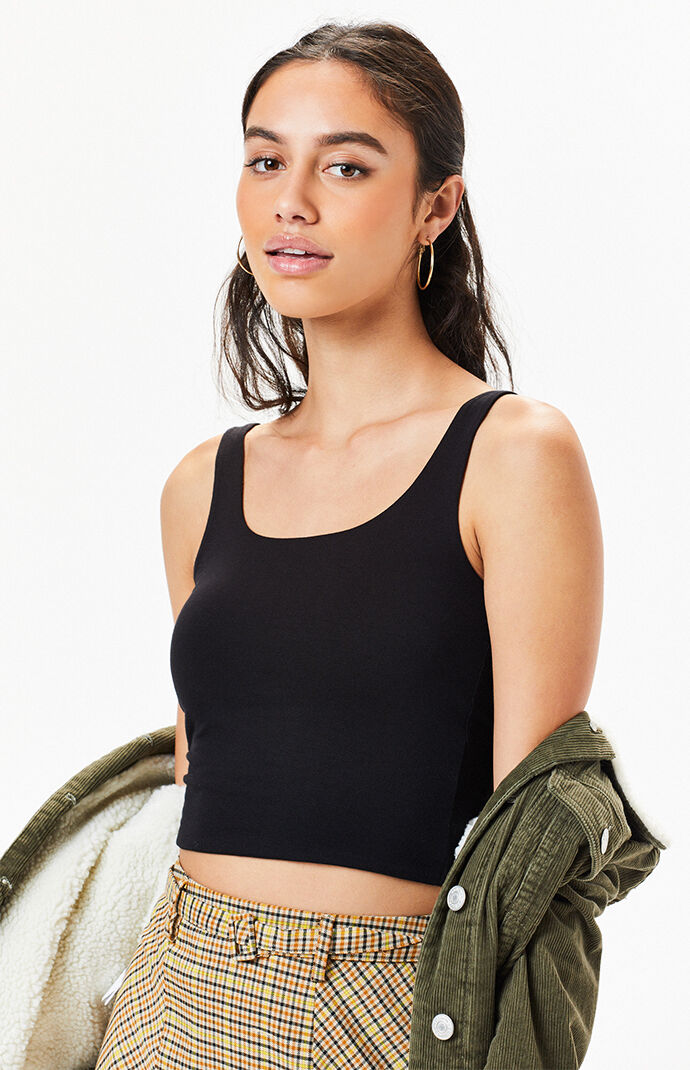The Wishful Tank Top by PacSun is the summer staple missing from your closet. This essential tank features a scoop neckline, wide fixed straps, and a cropped fit. Wide fixed straps Scoop neckline Cropped length Model is wearing an xsmall 95% rayon, 5% spandex Hand wash