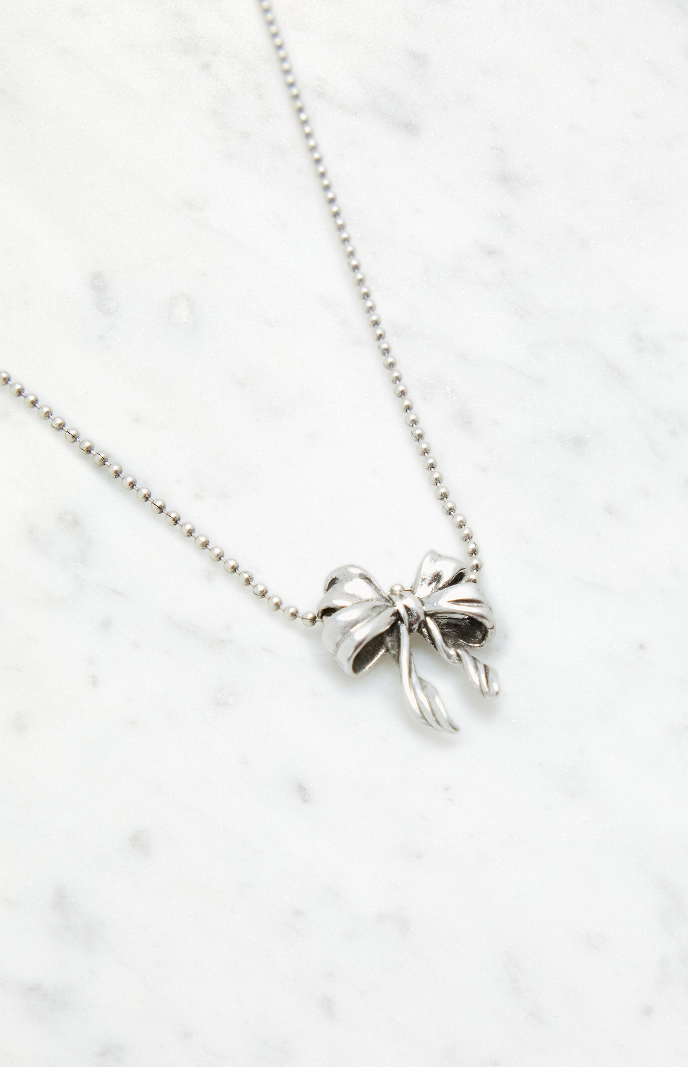 John Galt Silver Bow Necklace