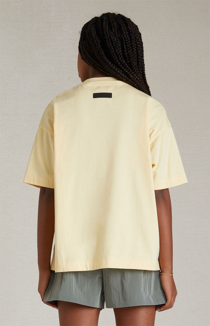 関税込＊FEAR OF GOD ESSENTIALS＊半袖Tシャツ ガーデンイエロー Fear of God Essentials Garden Yellow V-Neck T-Shirt | PacSun
