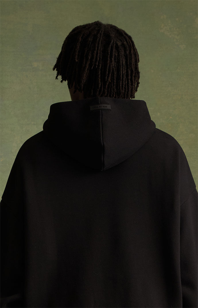 Fear of God Essentials Jet Black Hoodie PacSun