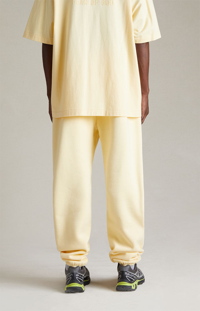 Fear of god outlet essentials sweatpants yellow