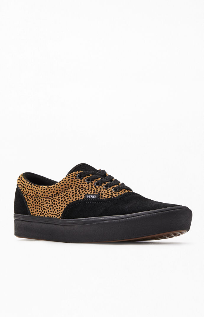 black and cheetah vans