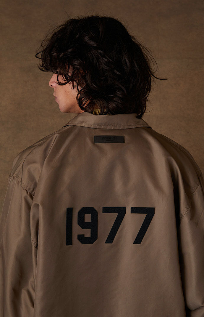 Fear of God Essentials Wood Coach Jacket | PacSun Fear of God Essentials Wood Coach Jacket | PacSun