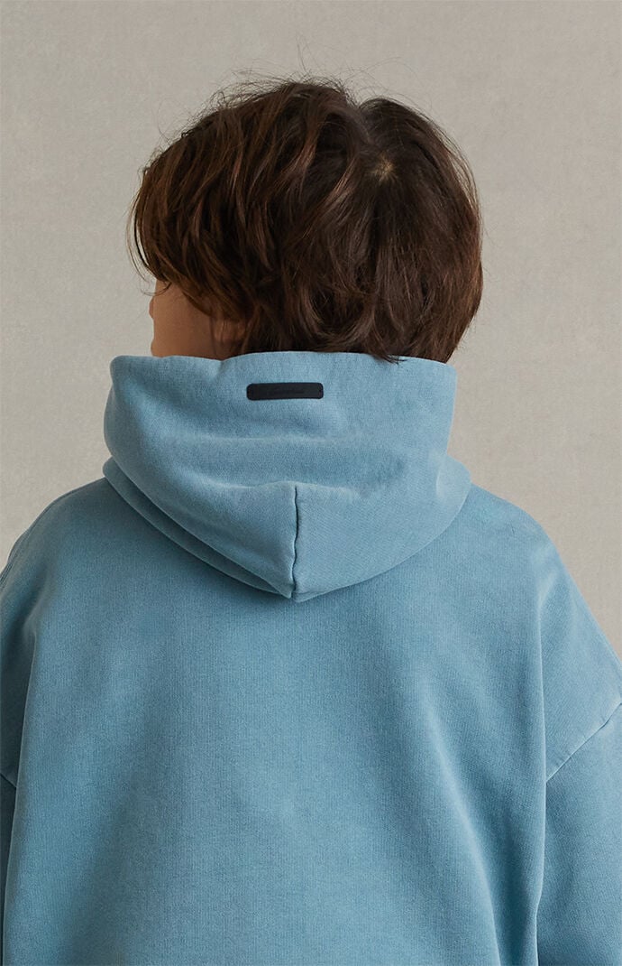 Fear of God ESSENTIALS Kids Faded Coastal Campus '90s Hoodie | Pacsun