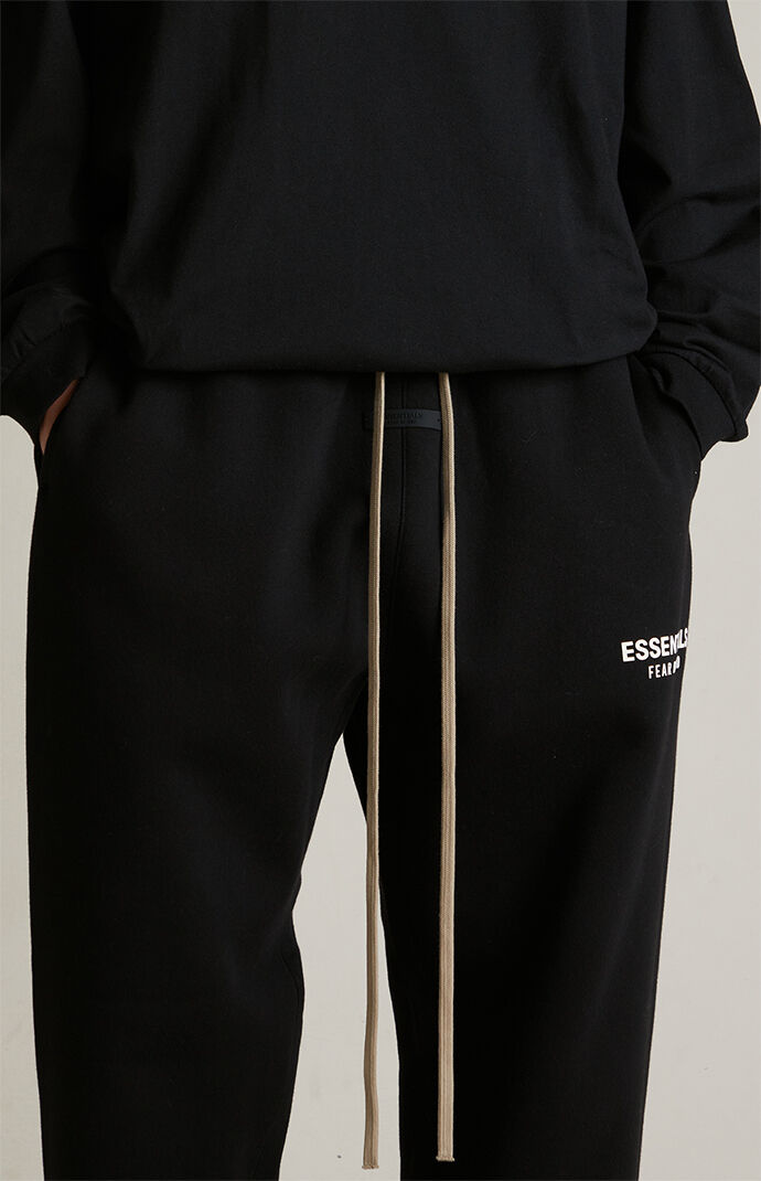 Fear of God Essentials Black Fleece Sweatpants | PacSun
