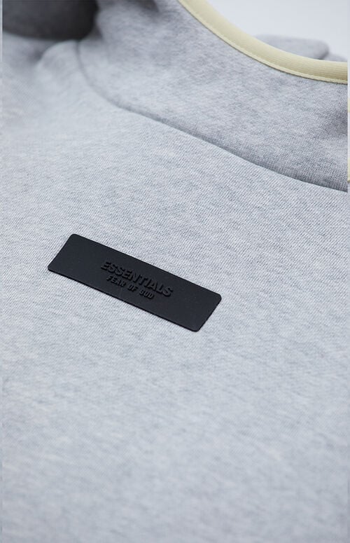 fear of god essentials hoodie light heather grey garden yellow