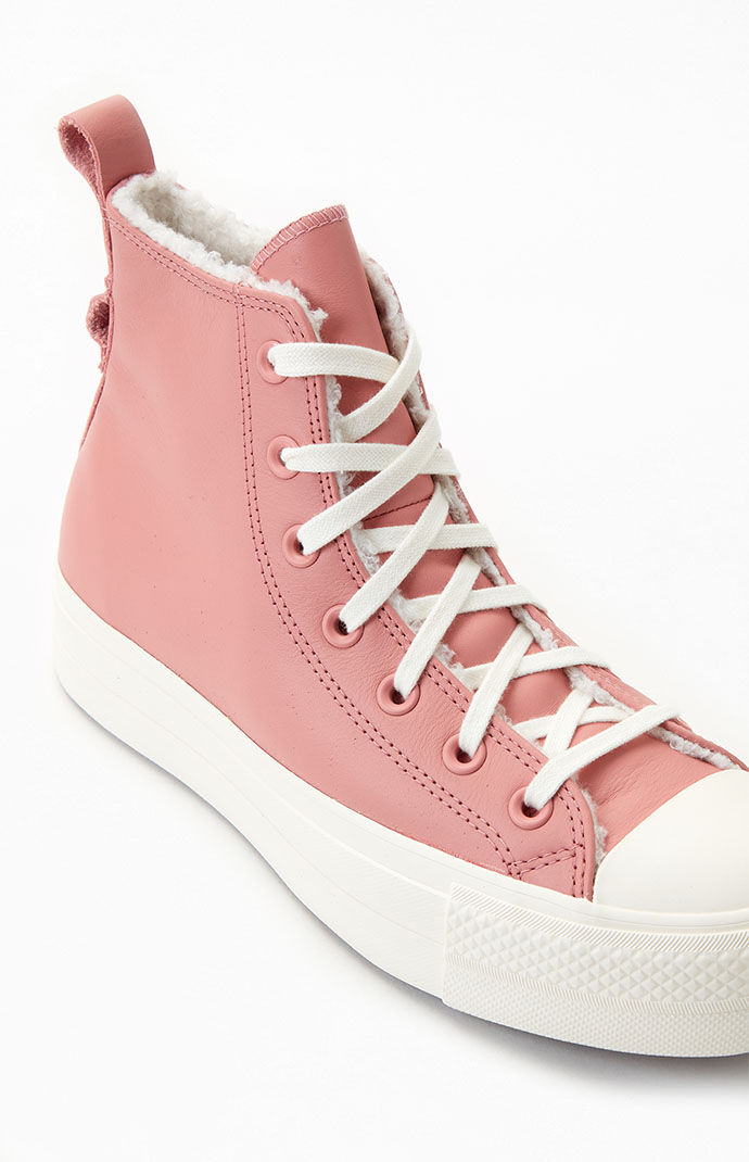 Pink leather chuck taylors hotsell