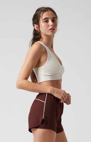 Active Brown Piping Dolphin Hem Track Shorts image number 4