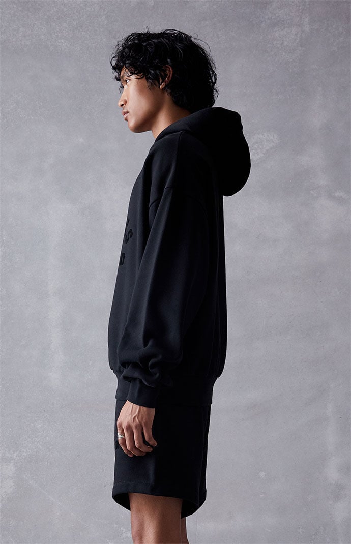Fear of God Essentials Jet Black Hoodie PacSun