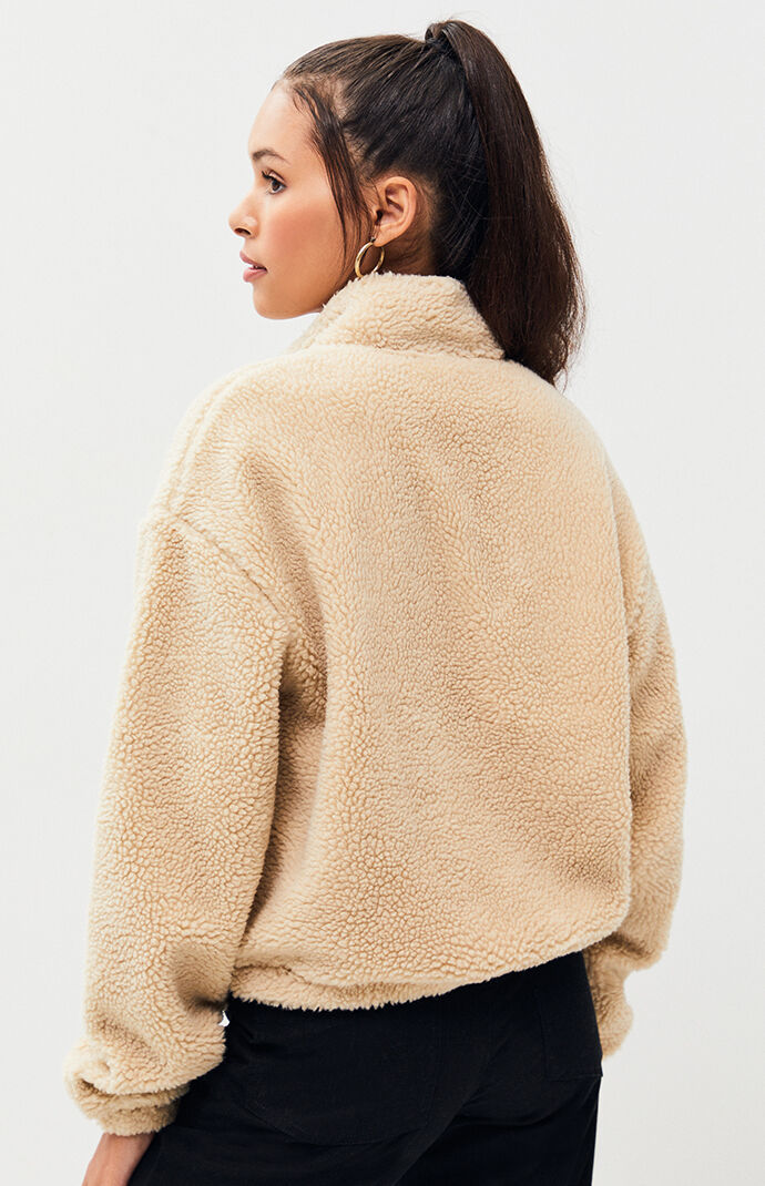 tan half zip sweater