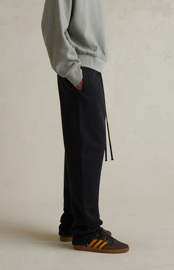Fear of God ESSENTIALS Jet Black Fleece Relaxed Sweatpants | Pacsun