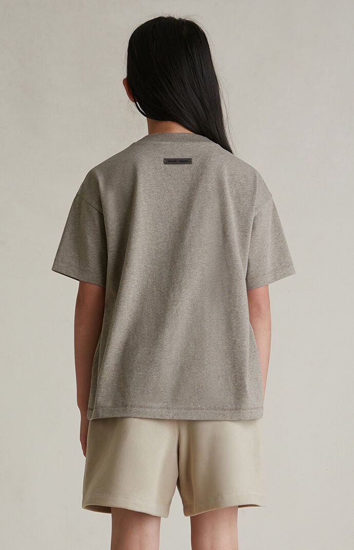 Fear of God ESSENTIALS Kids Timber Fleece Soccer Sweat Shorts | Pacsun