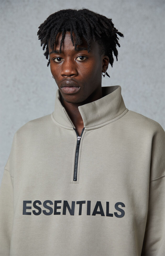 Fear of god essentials hot sale olive hoodie