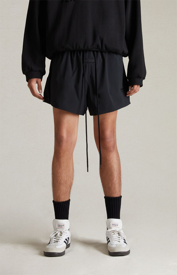 Fear of God Essentials Short de course en nylon léger toscan Homme de
