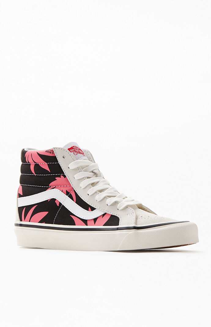 pink and black high top vans