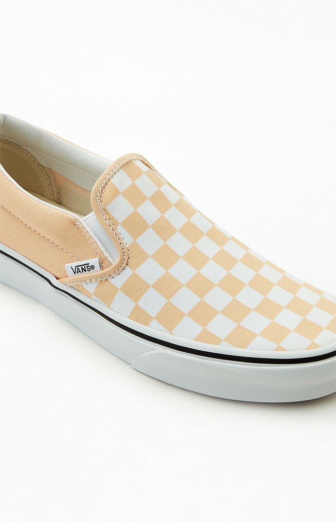 Peach checkered slip on vans on sale