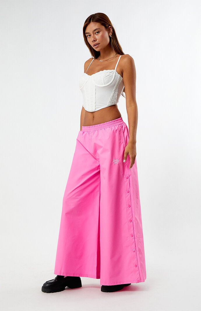 REEBOK × BARBIE トラックパンツ バービー ピンク リーボック Reebok x Barbie Wide Leg Track Pants | PacSun