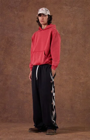 Black Flame Star Fleece Baggy Sweatpants image number 1