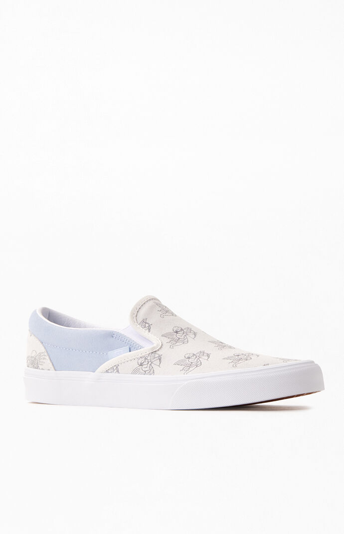 light blue vans slip ons