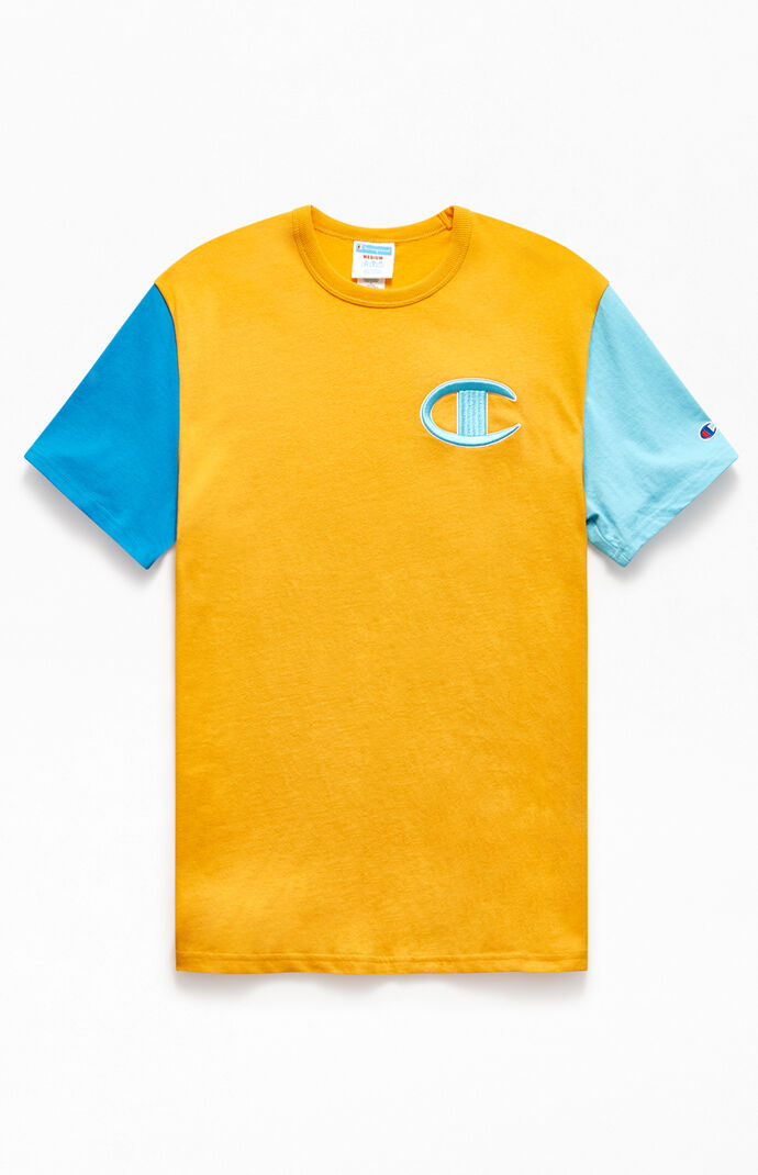 yellow and blue champion shirt