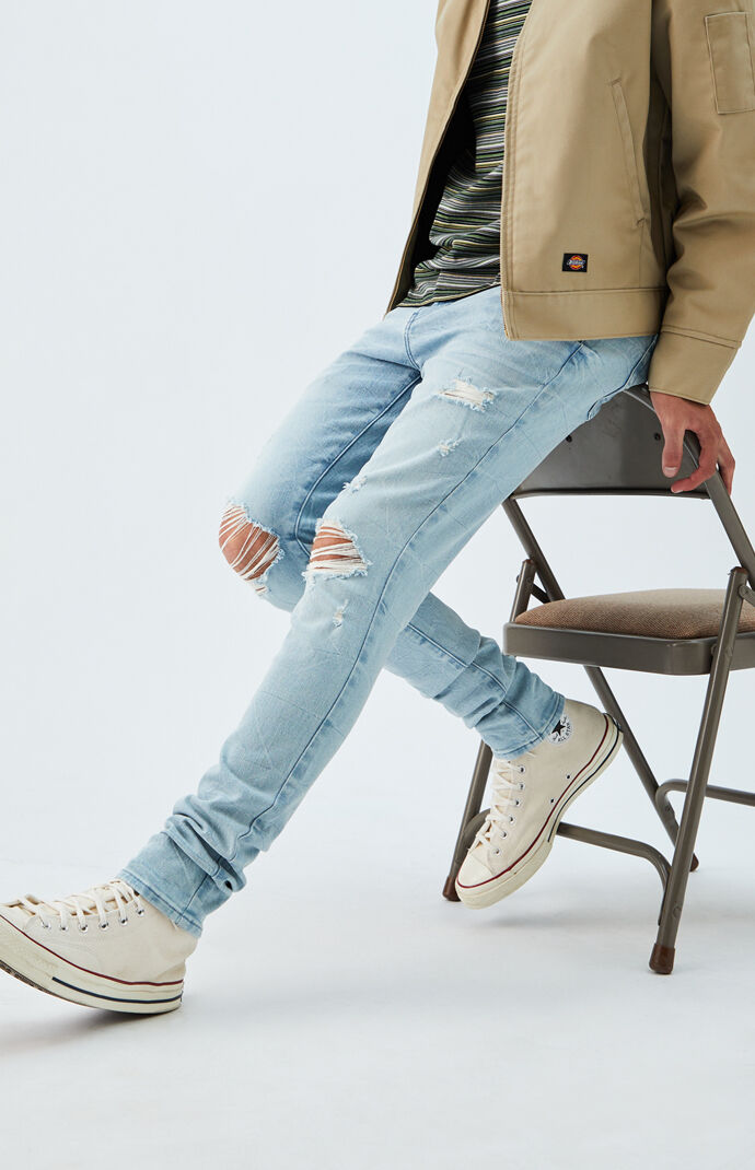 ripped stacked skinny jeans