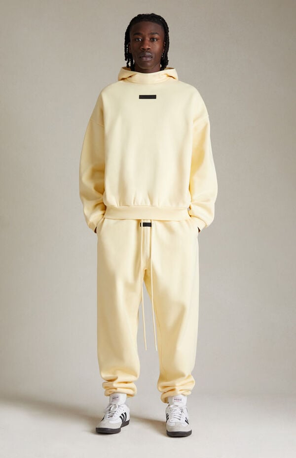 Fear of God ESSENTIALS Garden Yellow Hoodie PacSun