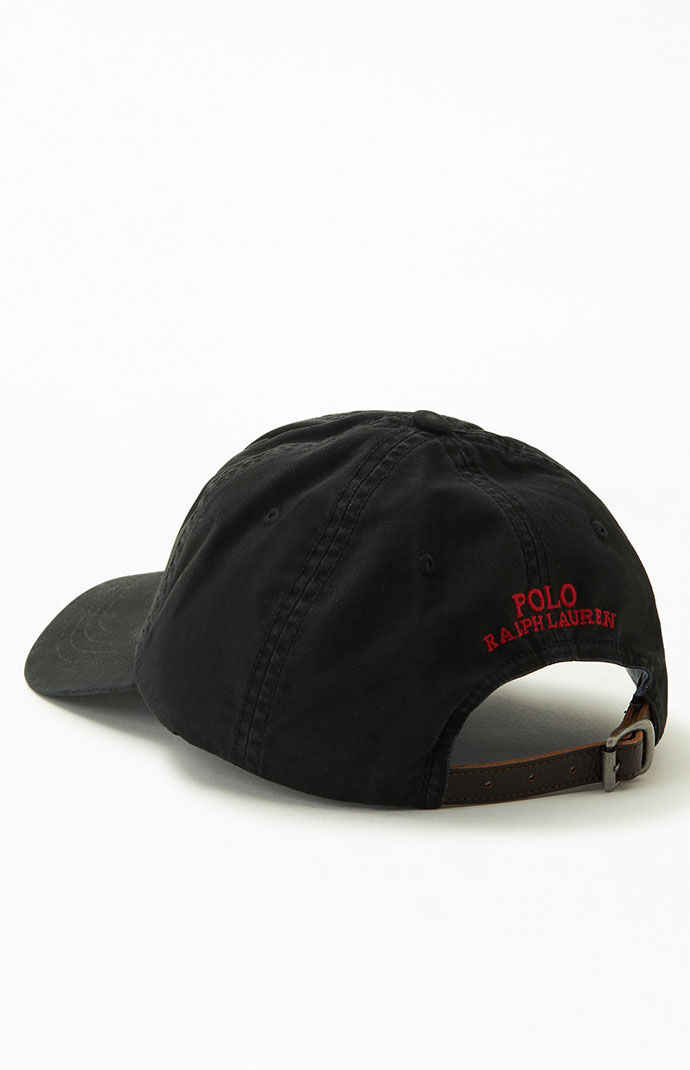 Black polo cap with leather strap
