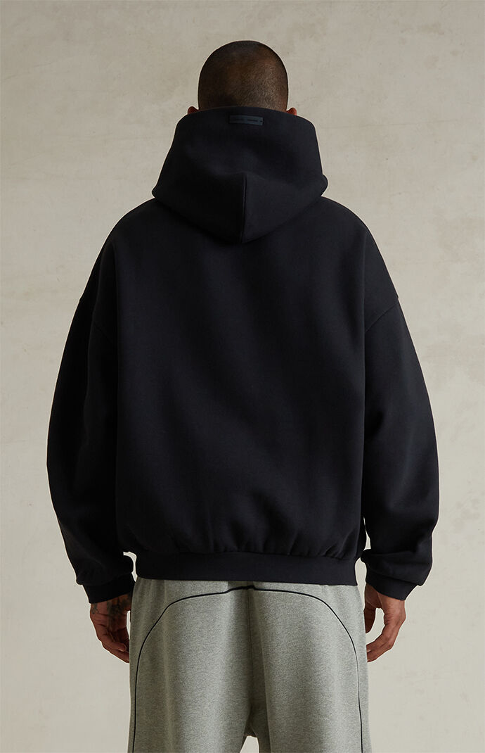 Fear of God ESSENTIALS Jet Black '90s Fit Fleece Hoodie | PacSun
