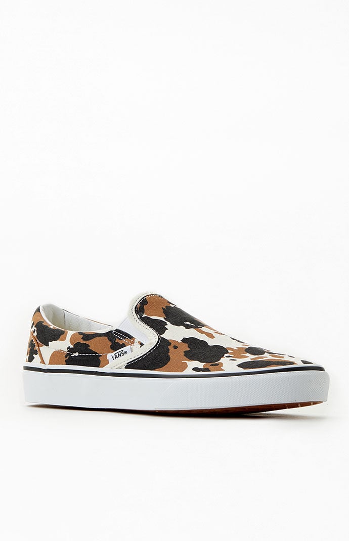 Vans cow print slip on discount
