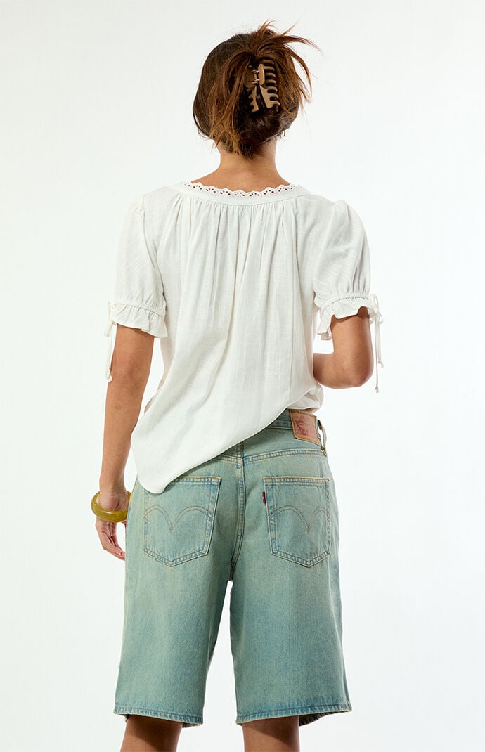 Levi's Light Blue Ripped Middy Jorts
